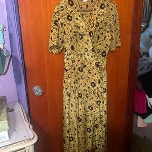 Vintage knee length gold dress with black designs